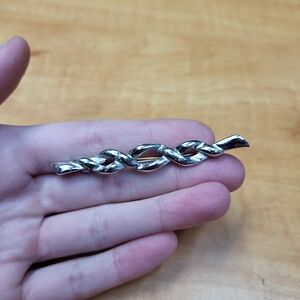 Elegant Silver Twisted Brooch